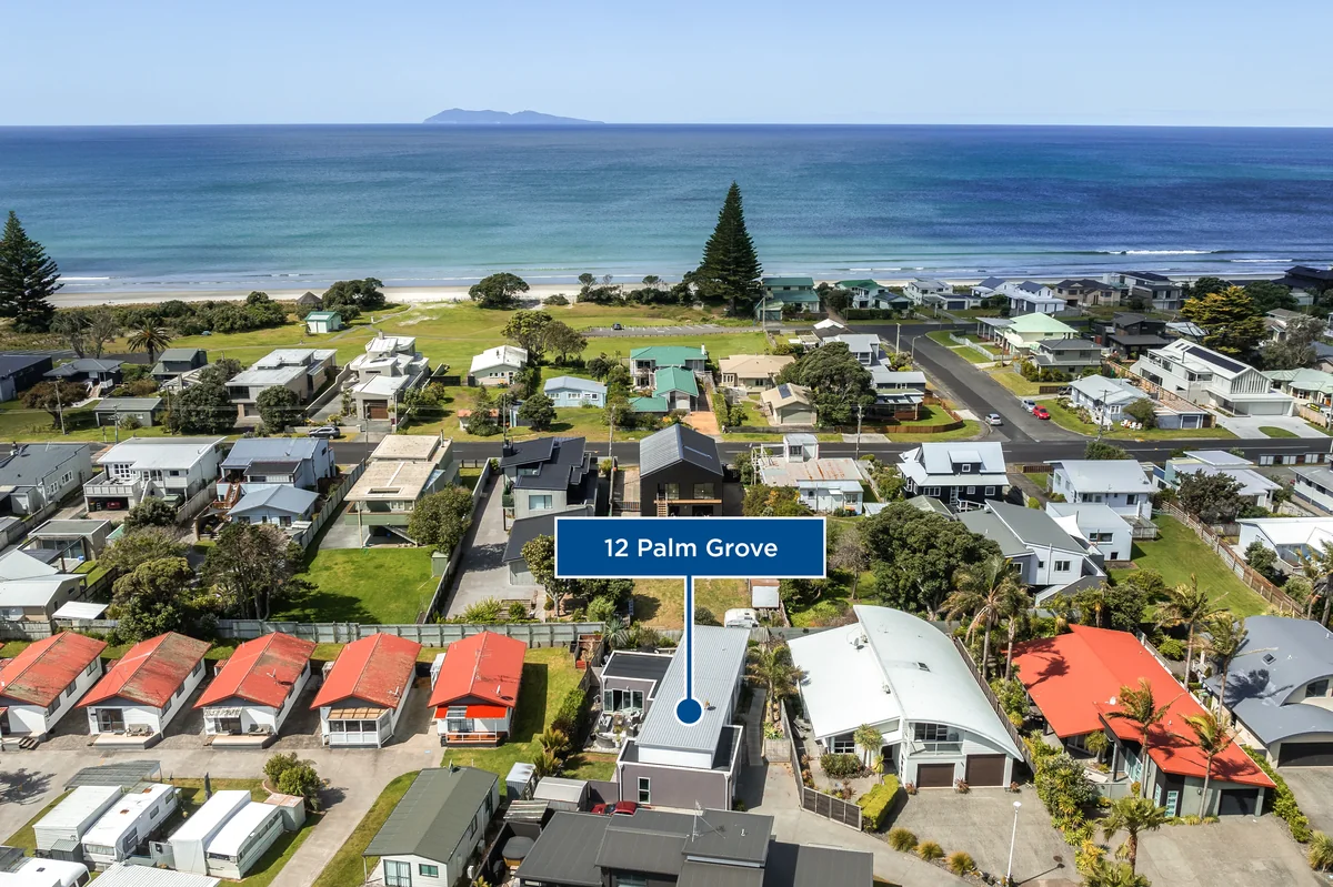 Aerial drone photograph of a coastal property.