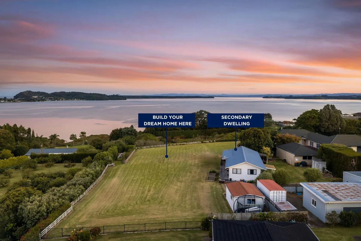 Room to build on the site, the estuary beyond at dusk