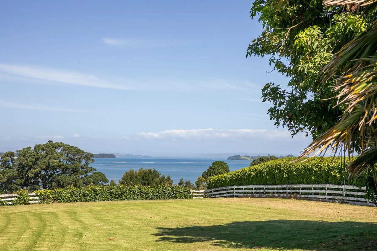 An island offshore beyond the garden